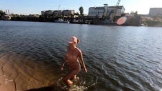 Naked exhibitionist MissMotivated bathes in the river