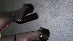 Brunette with foot fetish rubs big dick with her feet in POV